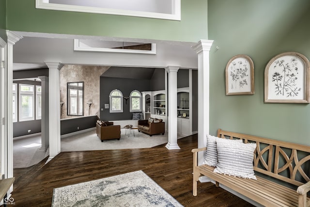 10919 Running Tide Ct, Indianapolis, IN 46236 - entryway featuring decorative columns, wood finished floors, a high ceiling, and baseboards