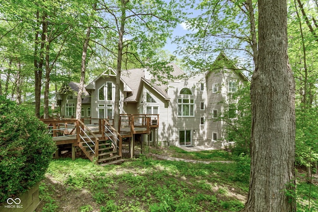 10919 Running Tide Ct, Indianapolis, IN 46236 - back of house featuring a deck, stairway, and a shingled roof