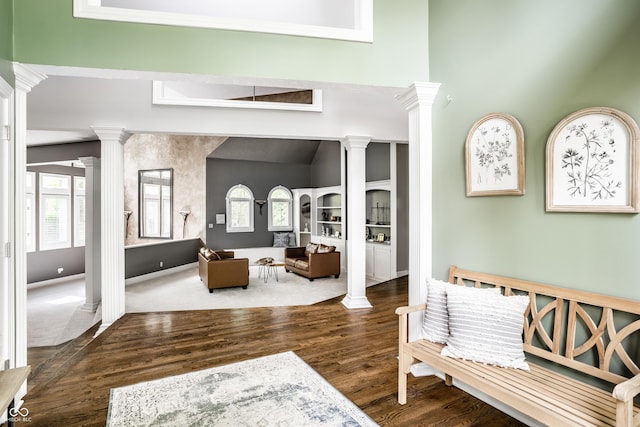 10919 Running Tide Ct, Indianapolis, IN 46236 - foyer entrance with ornate columns, wood finished floors, and a high ceiling