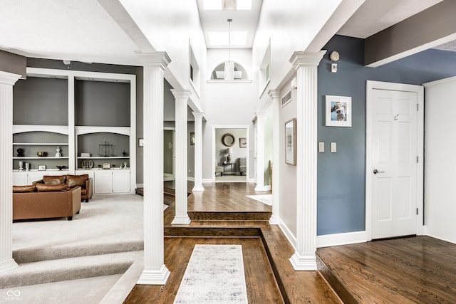 10919 Running Tide Ct, Indianapolis, IN 46236 - foyer featuring ornate columns and dark wood-style flooring