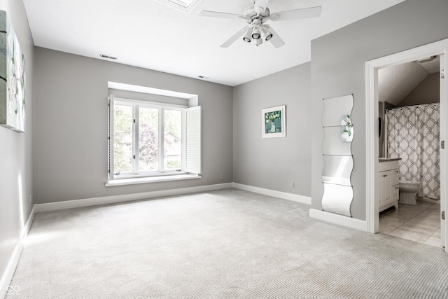 10919 Running Tide Ct, Indianapolis, IN 46236 - unfurnished bedroom with light carpet, ensuite bathroom, and a ceiling fan