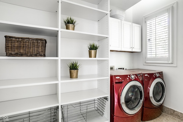 10919 Running Tide Ct, Indianapolis, IN 46236 - laundry room featuring washing machine and clothes dryer and cabinet space