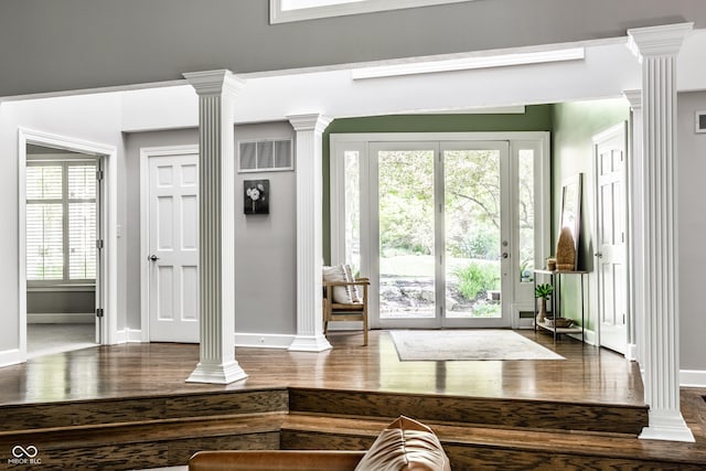 10919 Running Tide Ct, Indianapolis, IN 46236 - foyer featuring decorative columns and wood finished floors