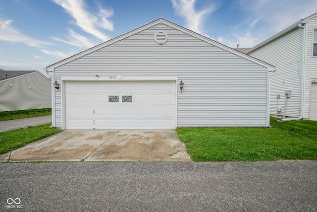 garage with driveway