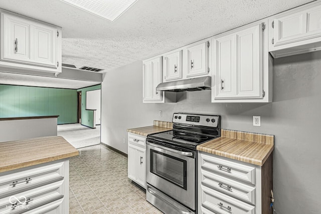 kitchen with stainless steel electric range oven, under cabinet range hood, light countertops, white cabinetry, and light flooring