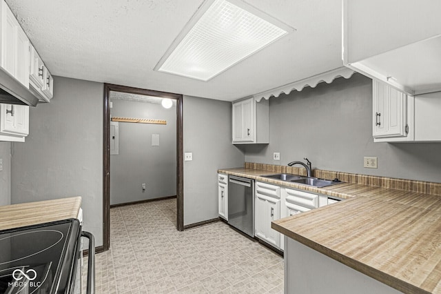 kitchen with stainless steel dishwasher, black / electric stove, a sink, white cabinets, and light floors