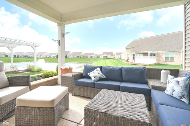 view of patio / terrace with an outdoor living space, a water view, a pergola, and a residential view