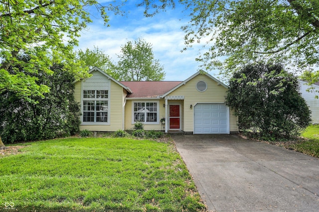 single story home featuring an attached garage, concrete driveway, and a front lawn