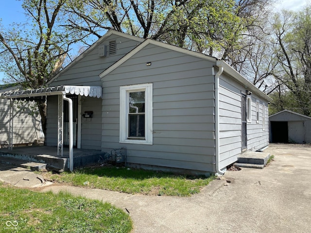 3541 Orchard Ave, Indianapolis, IN 46218 - bungalow-style home with an outdoor structure