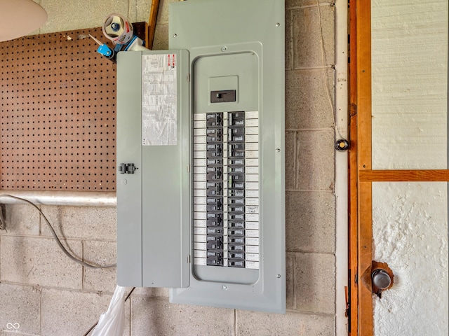 utility room featuring electric panel