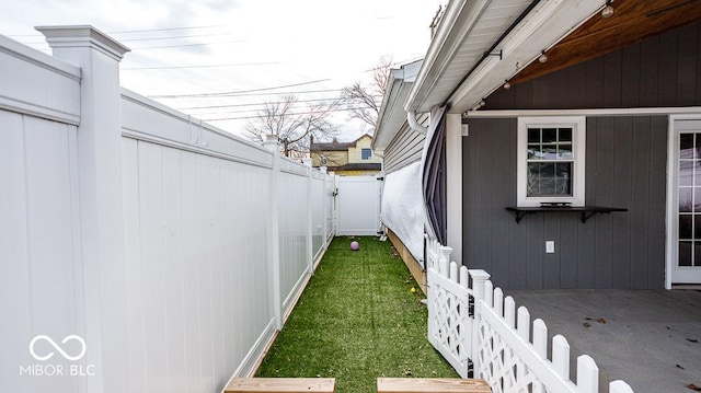 view of property exterior featuring a gate and fence private yard