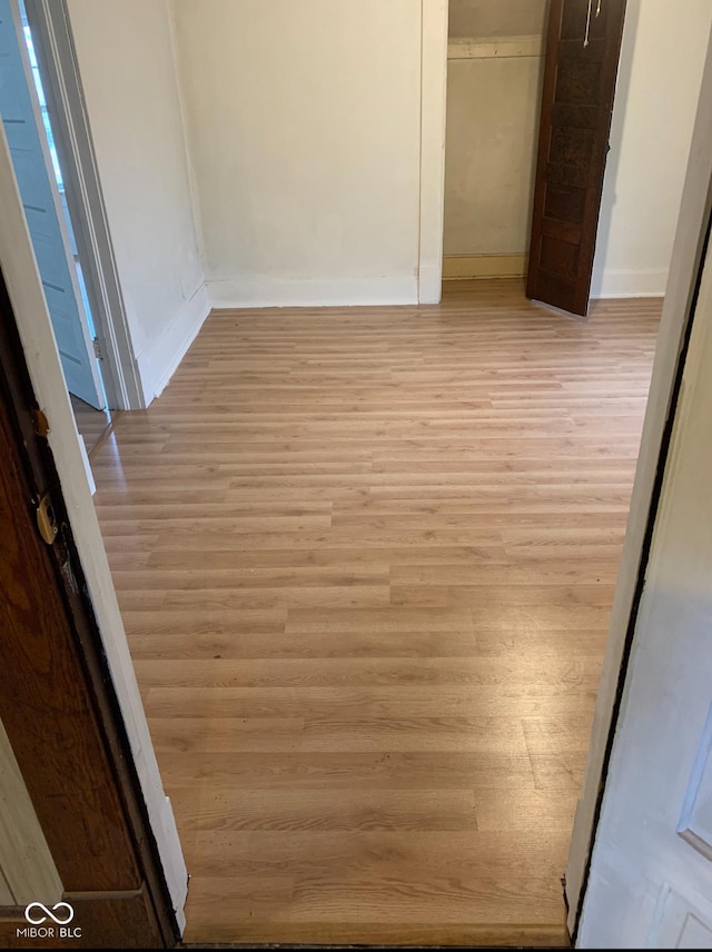 1634 7th Ave, Terre Haute, IN 47807 - interior space with baseboards, a closet, and light wood-style flooring