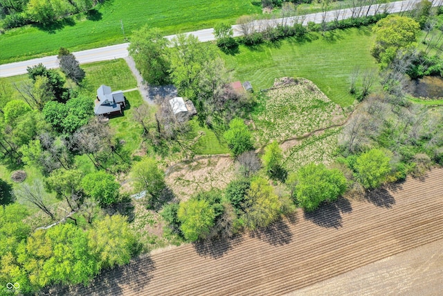 birds eye view of property featuring a rural view