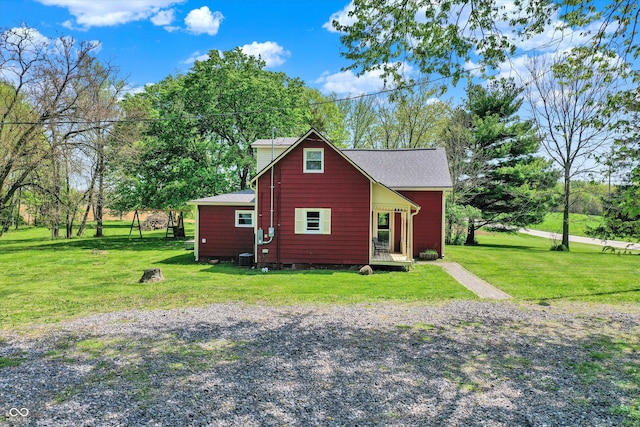 view of home's exterior featuring a yard