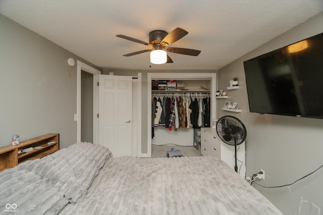 bedroom featuring a ceiling fan and a closet