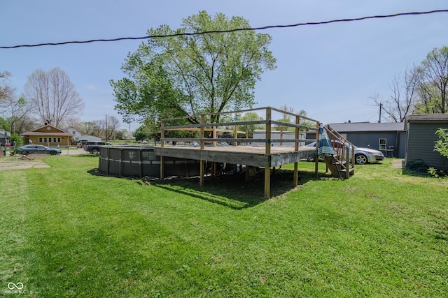 view of yard featuring a wooden deck