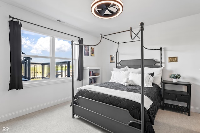 bedroom featuring carpet floors, baseboards, and visible vents