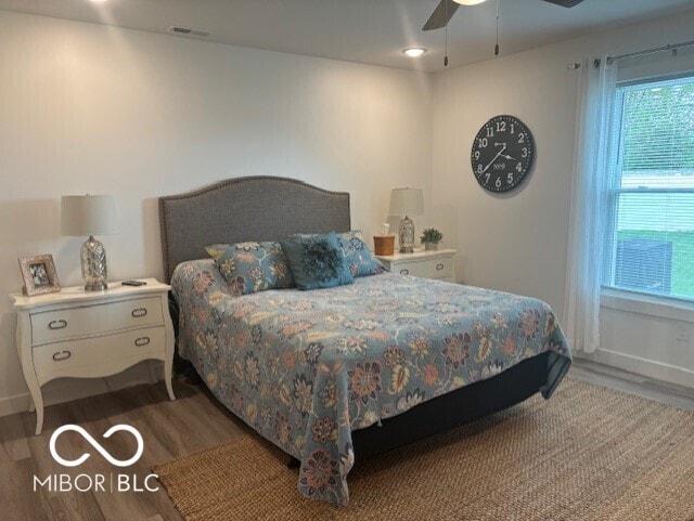 1511 Coen Ct, Columbus, IN 47201 - bedroom with visible vents, ceiling fan, wood finished floors, and baseboards