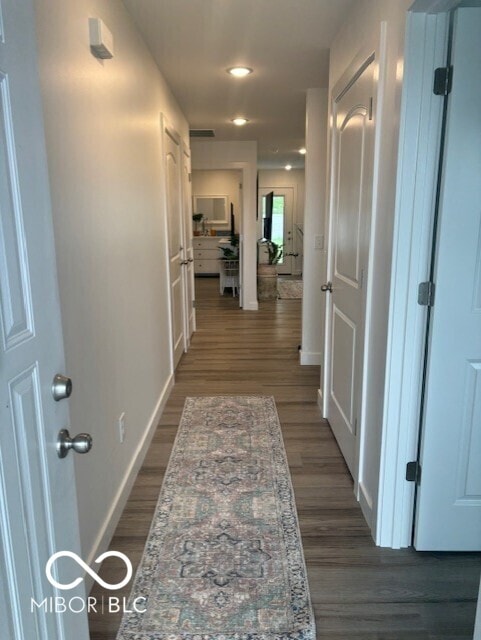 1511 Coen Ct, Columbus, IN 47201 - hallway with baseboards, recessed lighting, and dark wood-style flooring