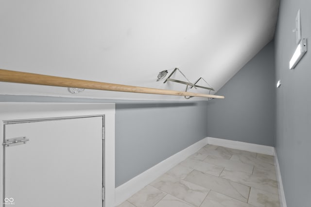 629 N Keystone Ave, Indianapolis, IN 46201 - spacious closet with light marble finish floors and lofted ceiling