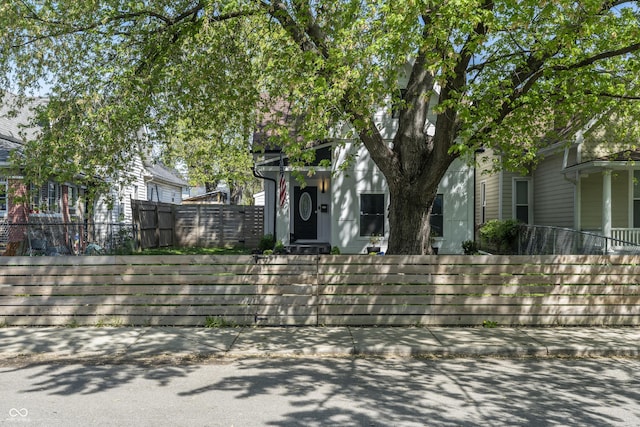 629 N Keystone Ave, Indianapolis, IN 46201 - view of property hidden behind natural elements featuring a fenced front yard