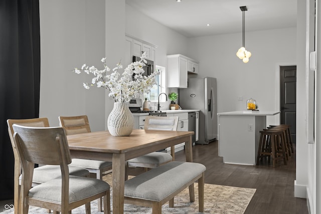 629 N Keystone Ave, Indianapolis, IN 46201 - dining space featuring dark wood finished floors, a towering ceiling, and recessed lighting