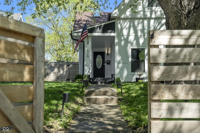 629 N Keystone Ave, Indianapolis, IN 46201 - doorway to property featuring a shingled roof