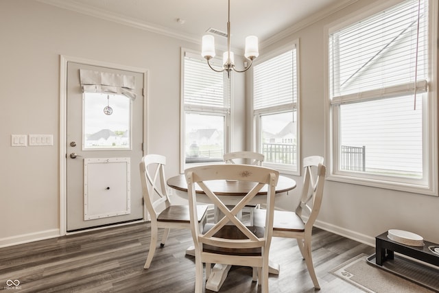 14878 Anees Ln, Fishers, IN 46040 - dining space featuring a chandelier, ornamental molding, wood finished floors, and baseboards