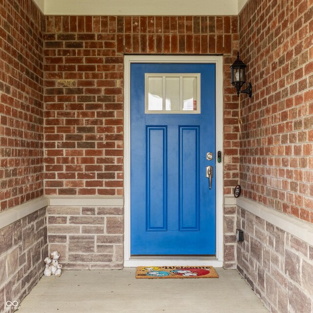 14878 Anees Ln, Fishers, IN 46040 - view of exterior entry featuring brick siding
