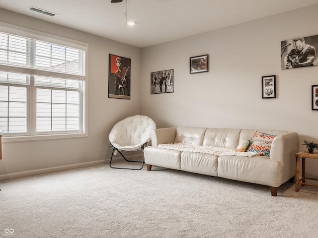 14878 Anees Ln, Fishers, IN 46040 - living room featuring carpet flooring, ceiling fan, and baseboards