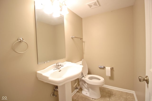 6634 Frankenberger Dr, Indianapolis, IN 46237 - half bath featuring tile patterned flooring and toilet