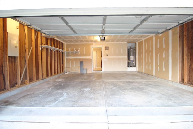 6634 Frankenberger Dr, Indianapolis, IN 46237 - garage with electric panel, water heater, and a garage door opener