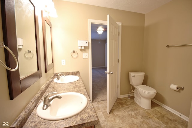 6634 Frankenberger Dr, Indianapolis, IN 46237 - bathroom with double vanity and toilet