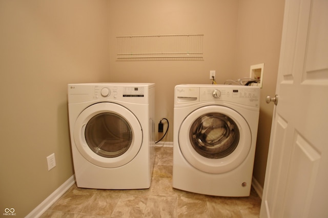 6634 Frankenberger Dr, Indianapolis, IN 46237 - laundry area with separate washer and dryer and baseboards