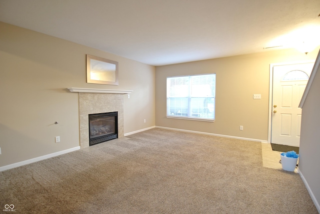 6634 Frankenberger Dr, Indianapolis, IN 46237 - unfurnished living room with carpet flooring and a tiled fireplace