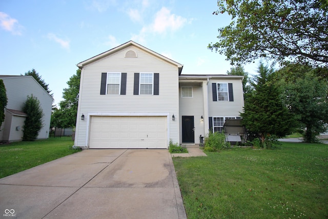 6634 Frankenberger Dr, Indianapolis, IN 46237 - traditional-style home featuring an attached garage, concrete driveway, and a front yard