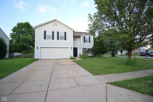 6634 Frankenberger Dr, Indianapolis, IN 46237 - traditional-style house featuring an attached garage, a front yard, and concrete driveway