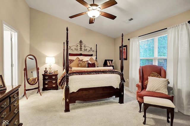 bedroom with baseboards, a ceiling fan, light colored carpet, and visible vents