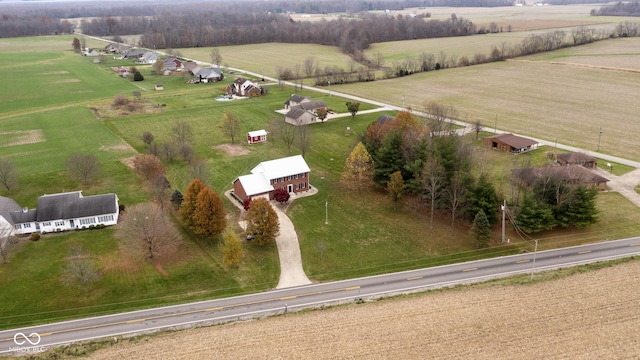 birds eye view of property featuring a rural view