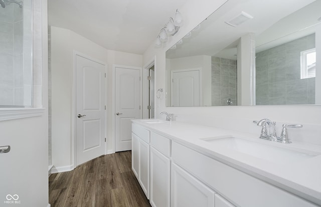 6871 Seabiscuit Rd, Whitestown, IN 46075 - full bath featuring wood finished floors and double vanity