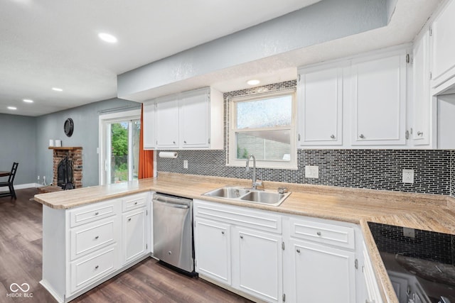 1416 Wellington Ave, Indianapolis, IN 46219 - kitchen featuring a peninsula, tasteful backsplash, a sink, and dishwasher