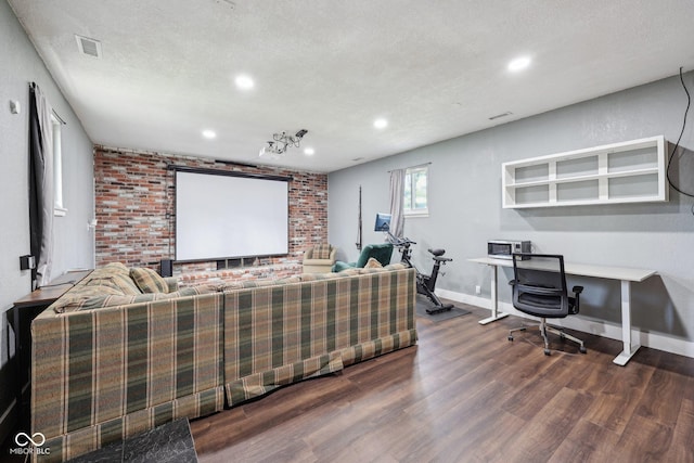 1416 Wellington Ave, Indianapolis, IN 46219 - living area featuring visible vents, wood finished floors, brick wall, recessed lighting, and a textured ceiling