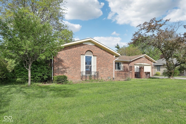 1416 Wellington Ave, Indianapolis, IN 46219 - single story home with brick siding, a front lawn, and an attached garage