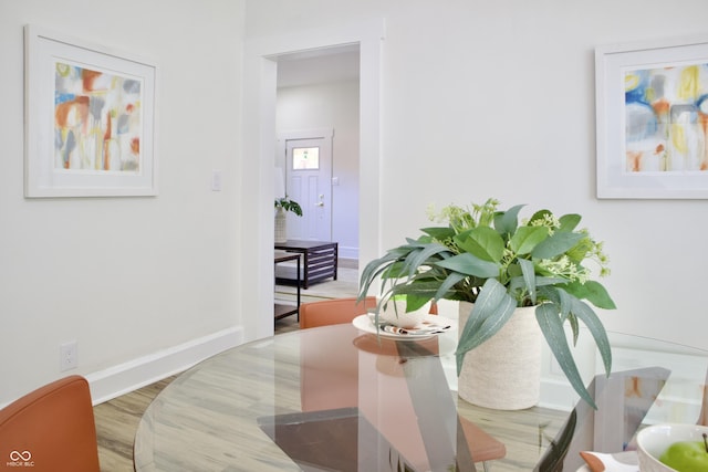 474 N Randolph St, Indianapolis, IN 46201 - dining area featuring baseboards and wood finished floors