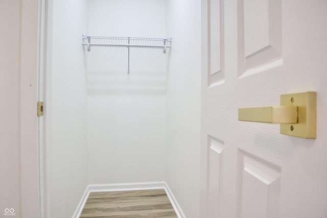 474 N Randolph St, Indianapolis, IN 46201 - spacious closet featuring wood finished floors
