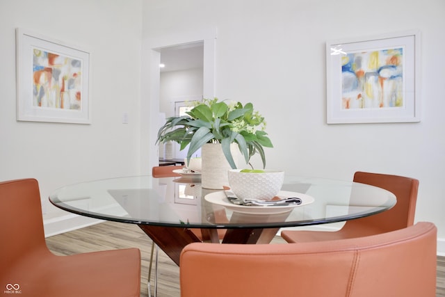 474 N Randolph St, Indianapolis, IN 46201 - dining space with baseboards and wood finished floors