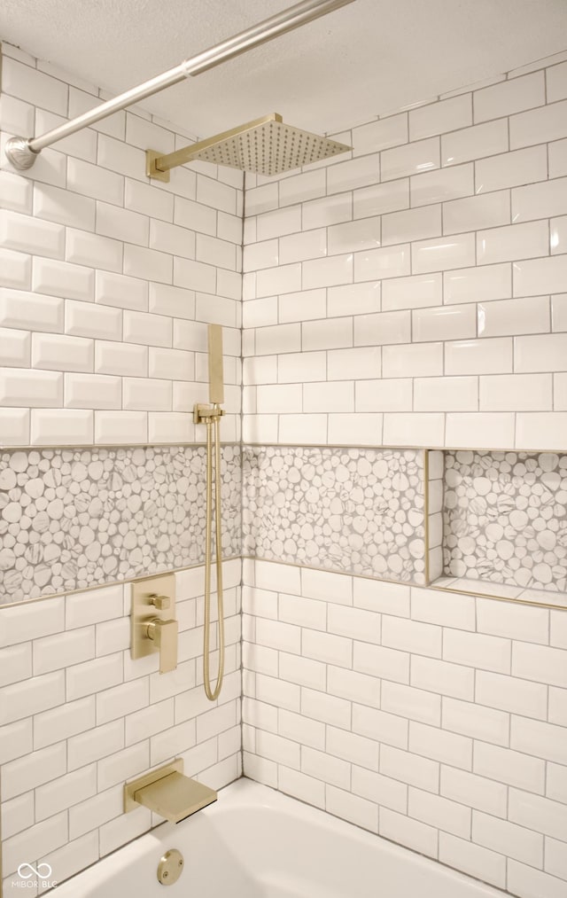474 N Randolph St, Indianapolis, IN 46201 - bathroom with a textured ceiling and shower / tub combination