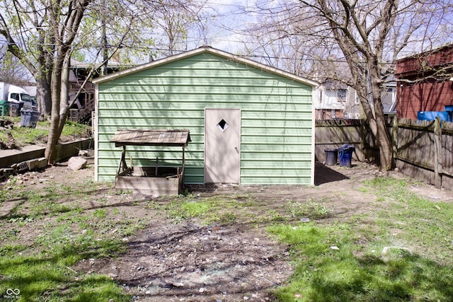 474 N Randolph St, Indianapolis, IN 46201 - view of outdoor structure with fence and an outbuilding