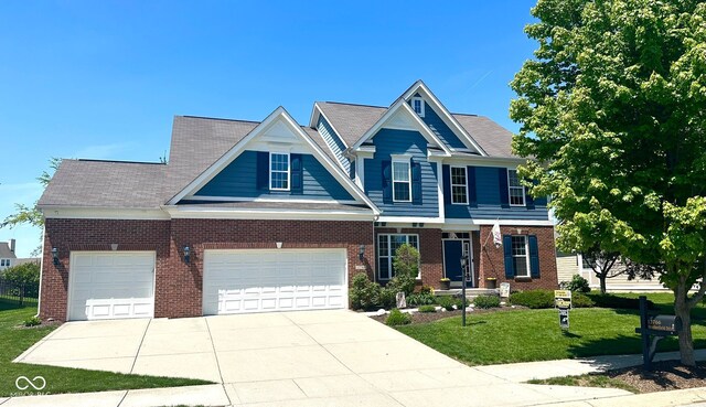 view of front of property featuring brick siding, concrete driveway, a front lawn, and a garage