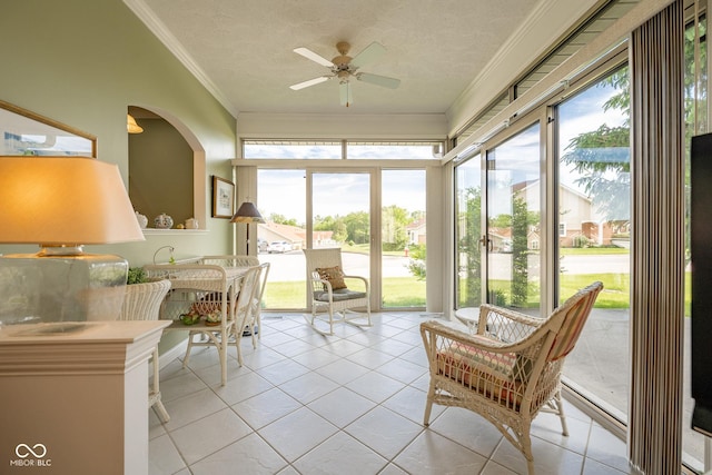 476 Glenview Dr, Greencastle, IN 46135 - sunroom featuring crown molding, tile patterned flooring, a textured ceiling, and arched walkways